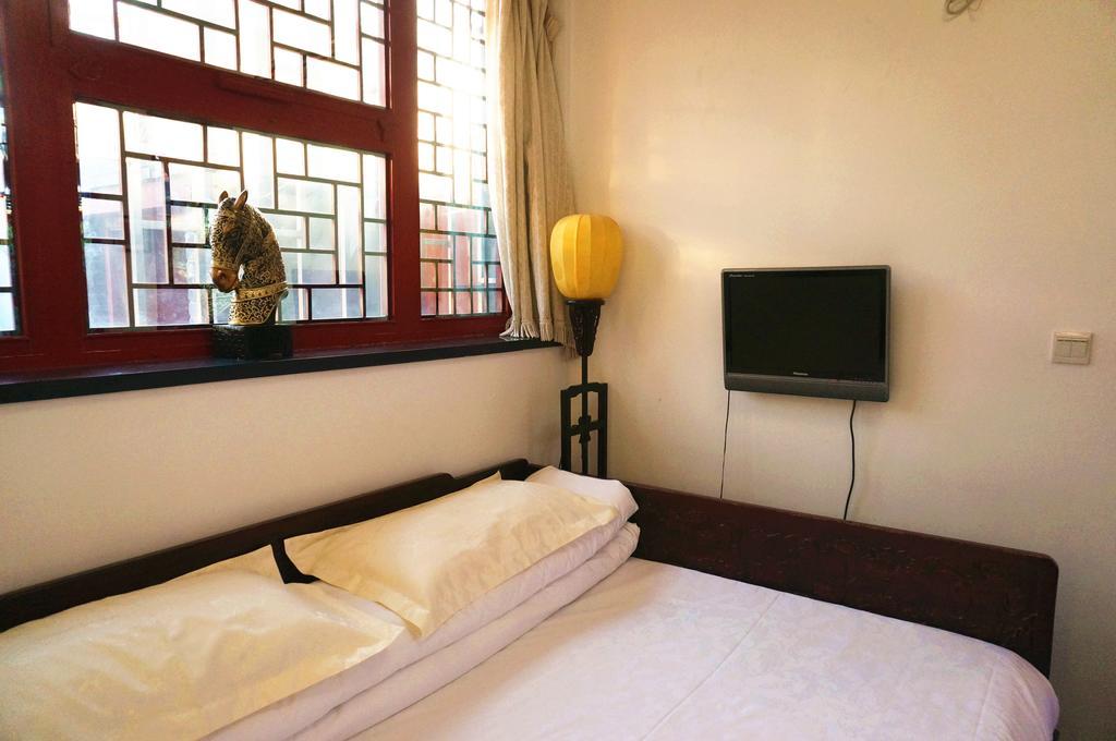 Templeside Deluxe Hutong Hotel Пекін Номер фото