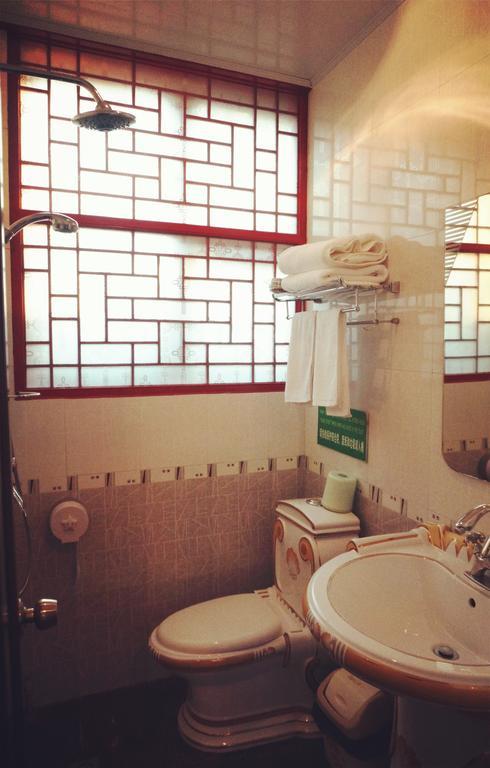 Templeside Deluxe Hutong Hotel Пекін Номер фото